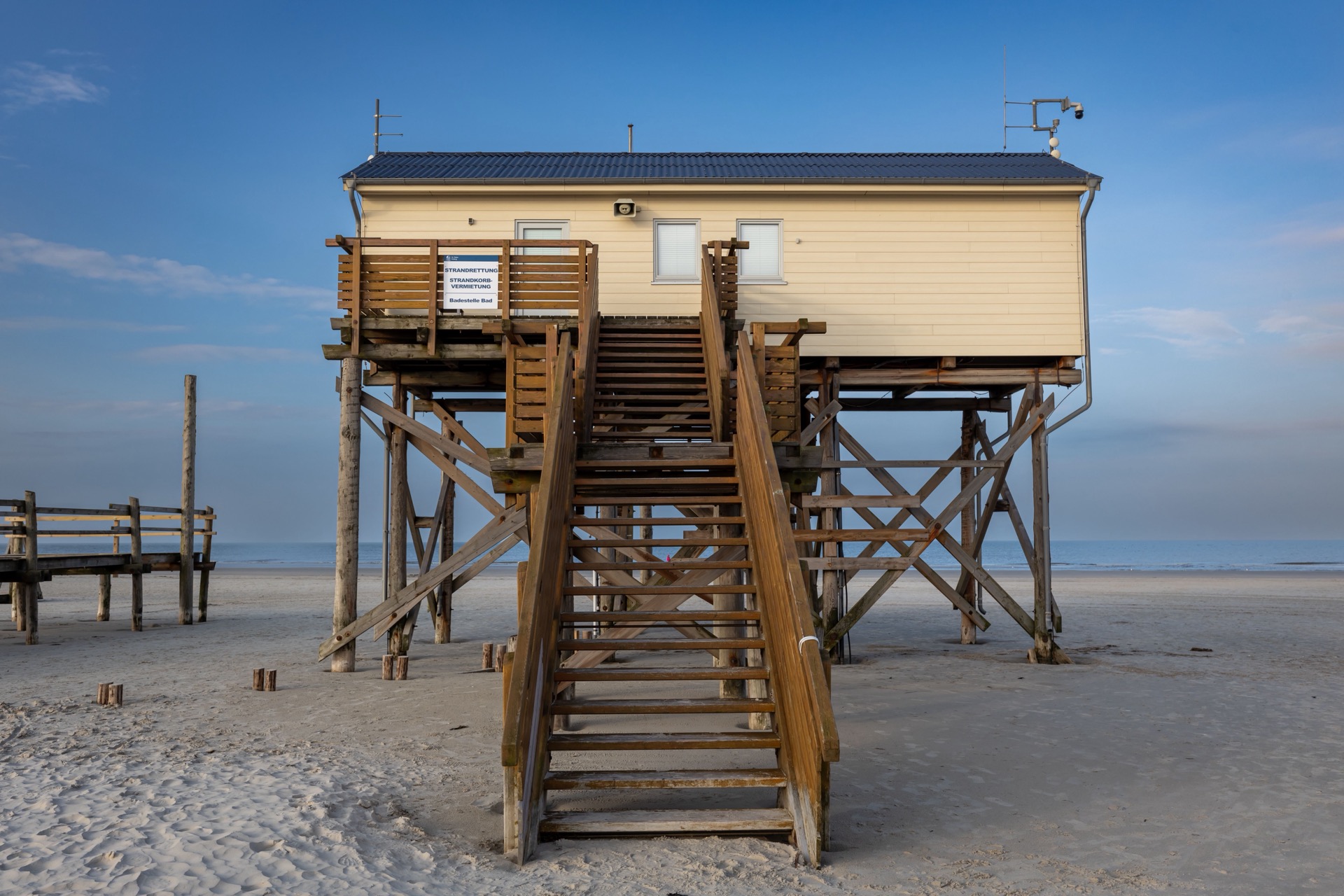 Coastal beach house elevated on wooden pilings above the flood line on the Jersey Shore, New Jersey